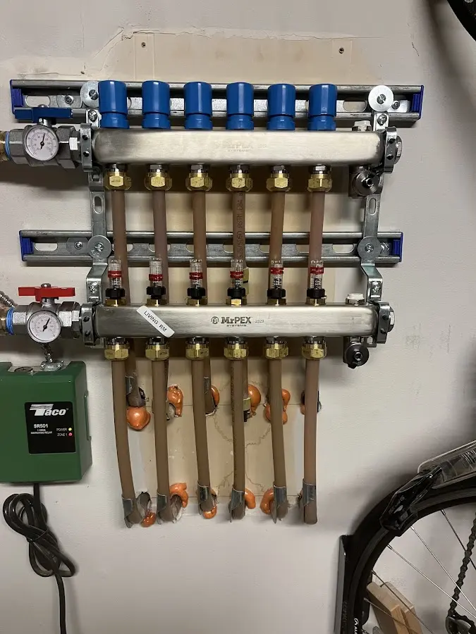 Plumber performing Gas Leak Detection at a residential property in Geneva